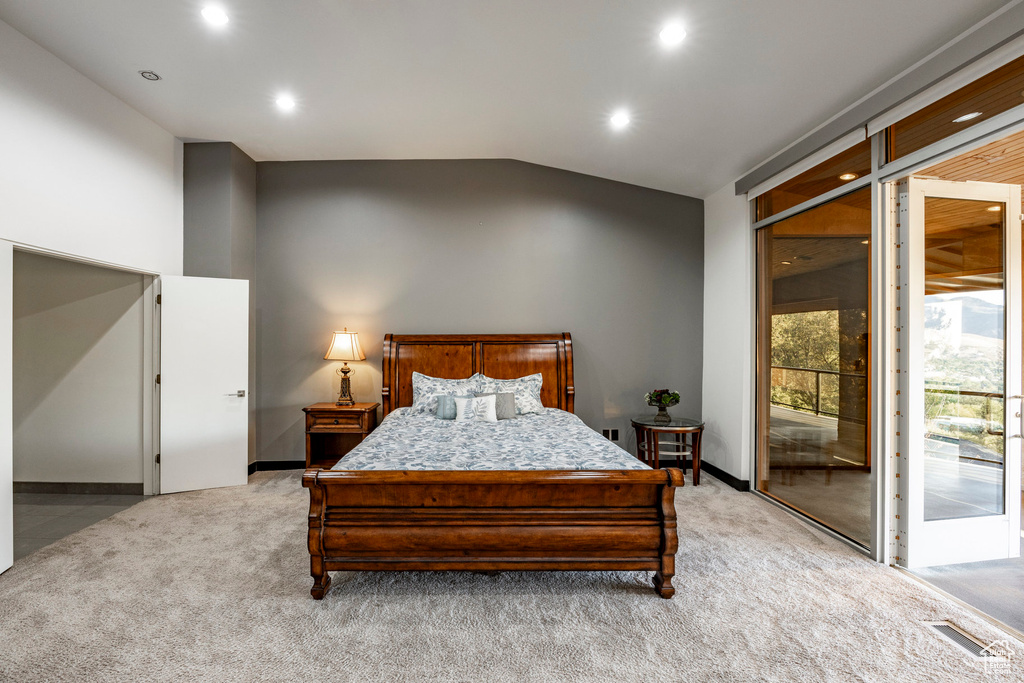 Bedroom featuring access to outside, light carpet, recessed lighting, vaulted ceiling, and baseboards