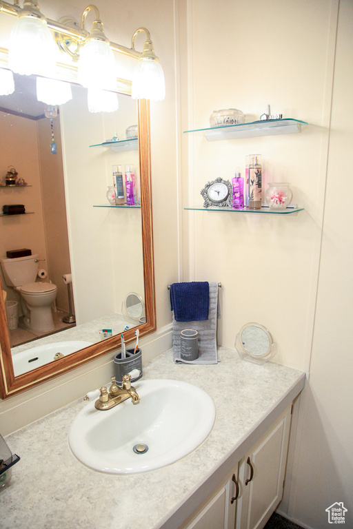 Bathroom with vanity and toilet