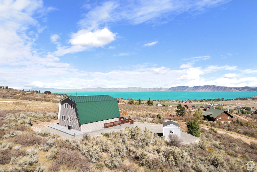 Property view of water with a mountain view