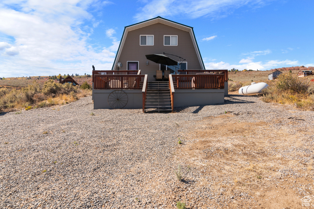 Exterior space with a wooden deck