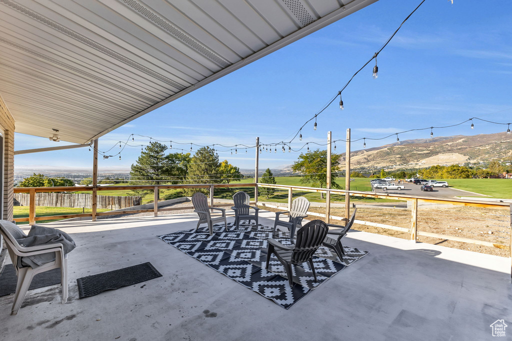 View of patio / terrace featuring a mountain view