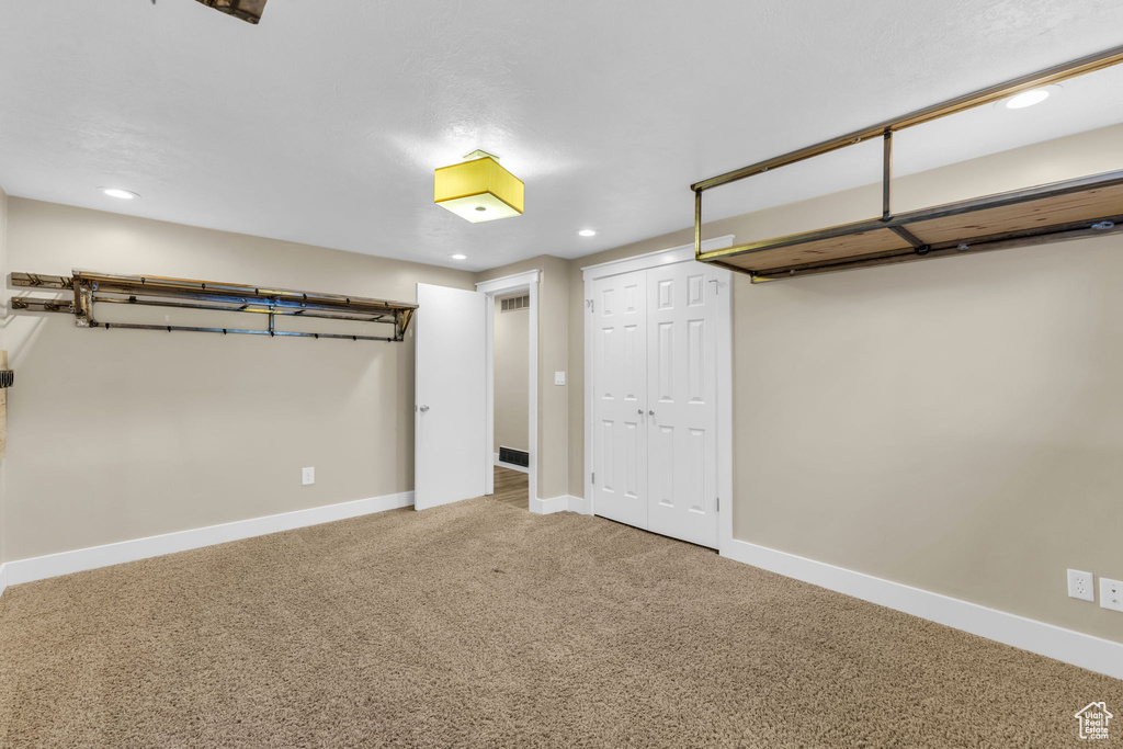 Basement with carpet floors