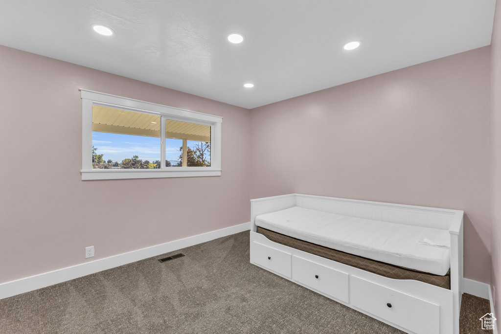 Unfurnished bedroom featuring carpet