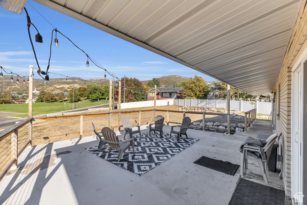 View of patio / terrace with a mountain view