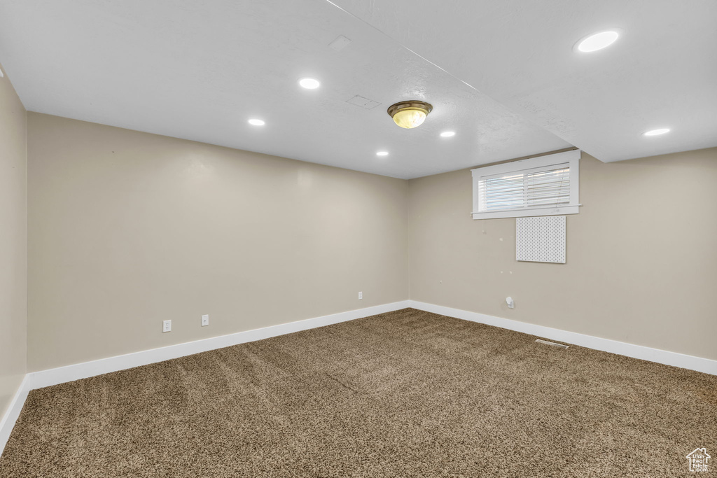 Basement featuring carpet floors