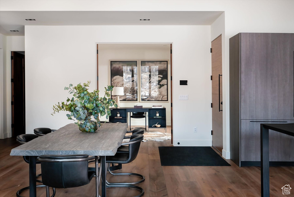 Dining space featuring hardwood / wood-style floors