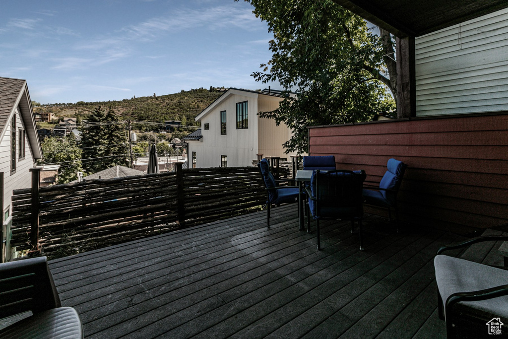 Wooden deck featuring a mountain view