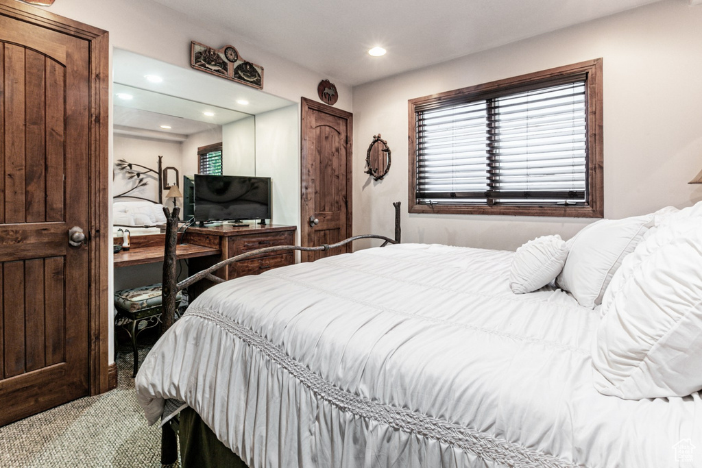 Bedroom with carpet flooring