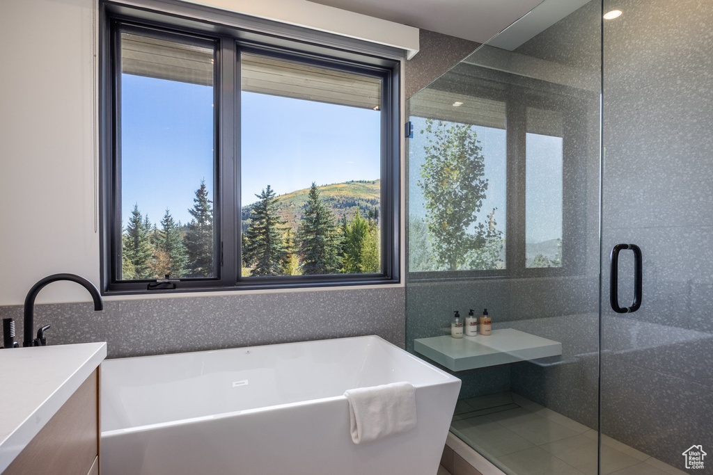 Bathroom with plus walk in shower