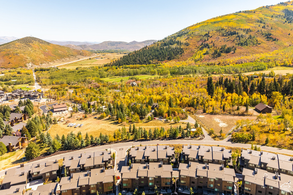 Birds eye view of property featuring a mountain view