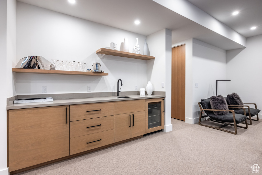 Interior space with sink and beverage cooler