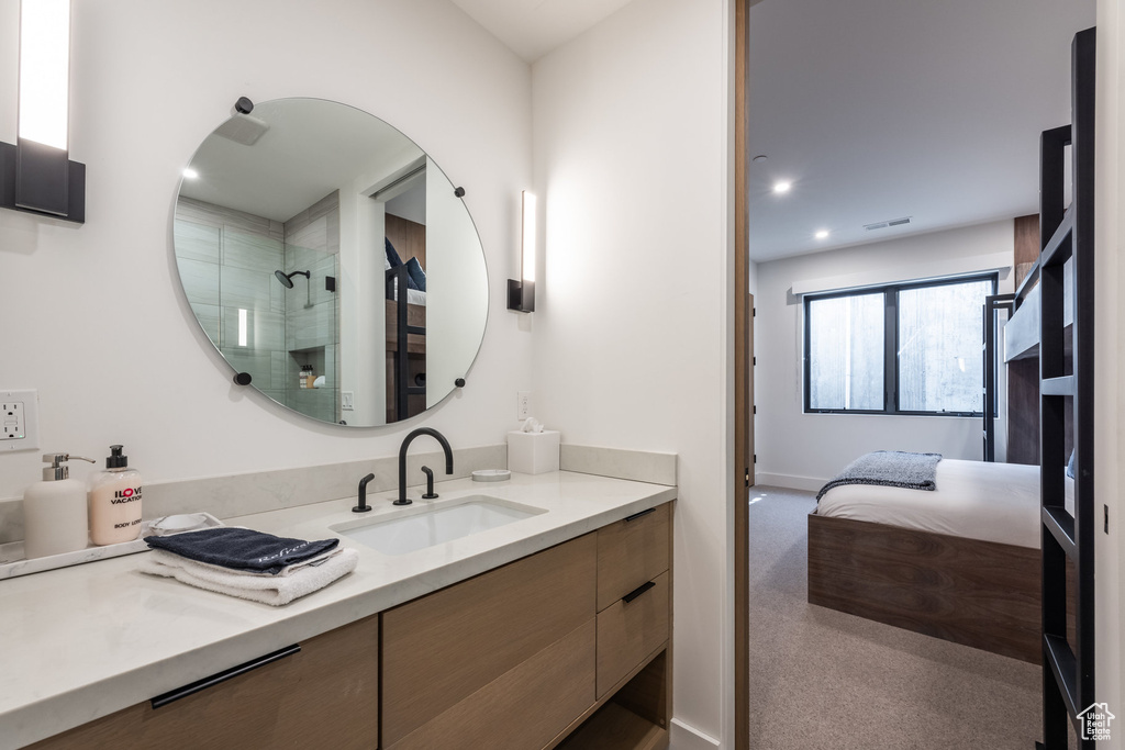 Bathroom with vanity and walk in shower