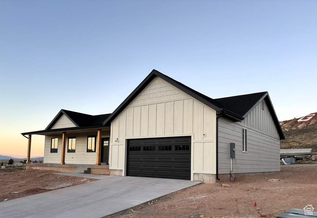 Modern farmhouse featuring a garage