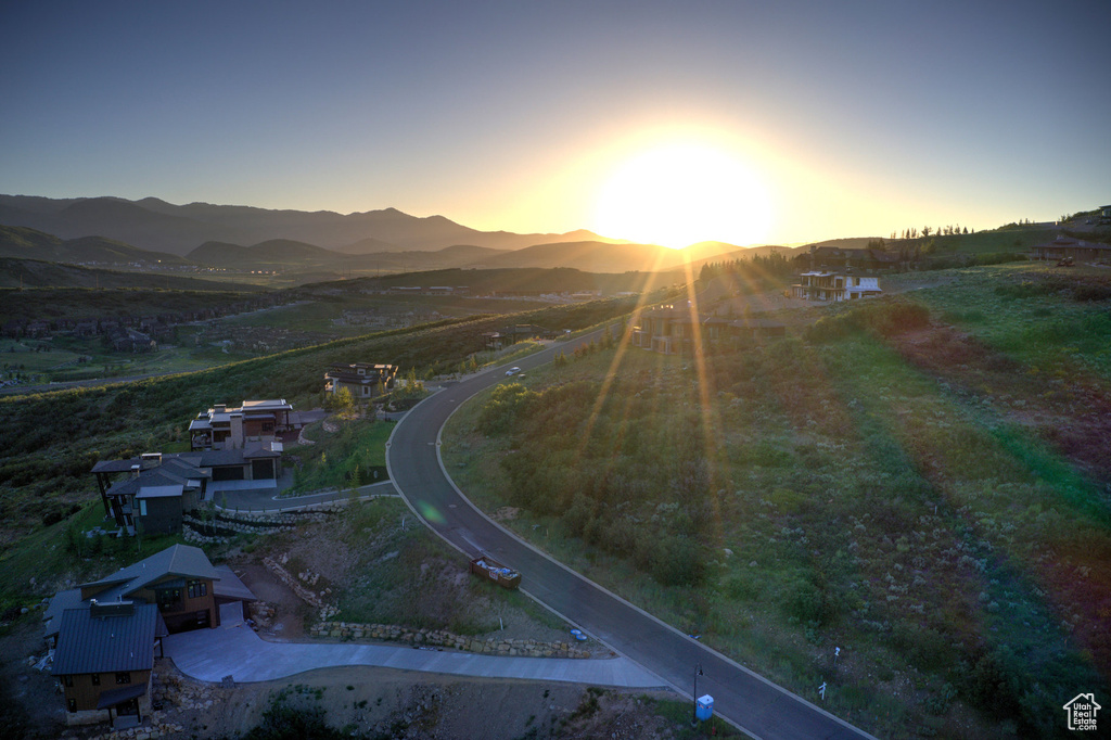 Aerial view at dusk of a mountain view and a view of countryside