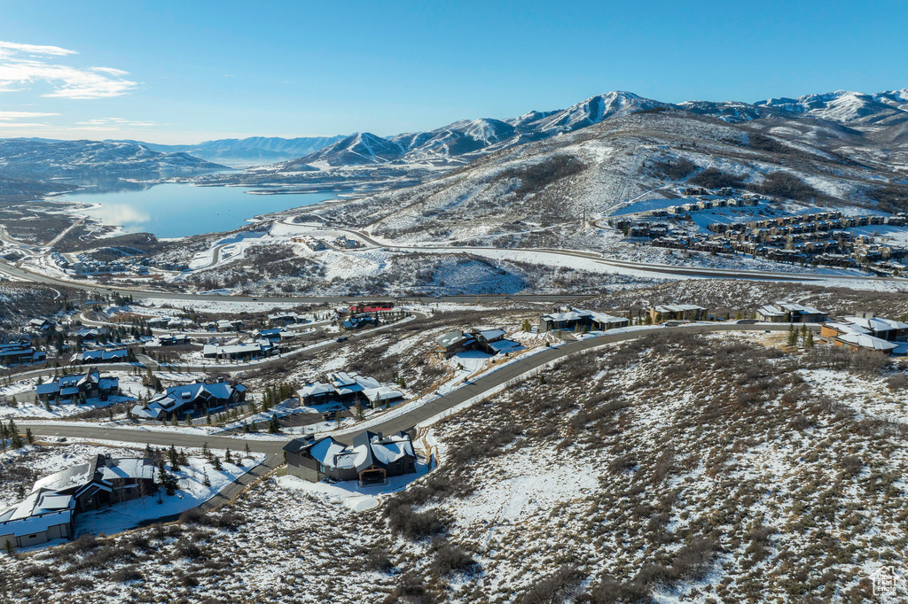 Snowy aerial view with a mountain view