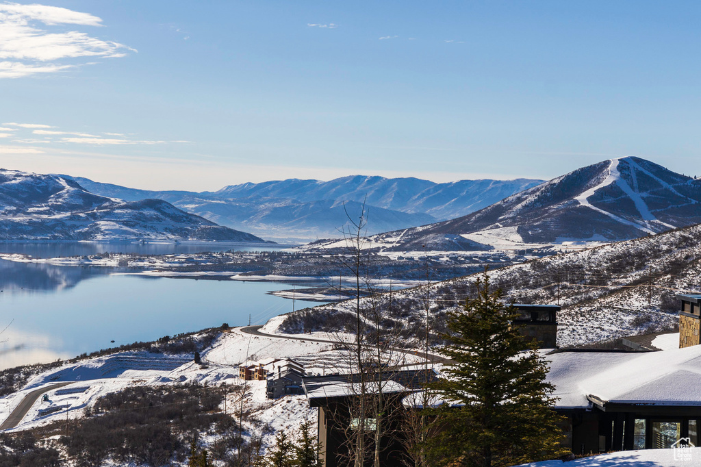 View of mountain background featuring a nearby body of water