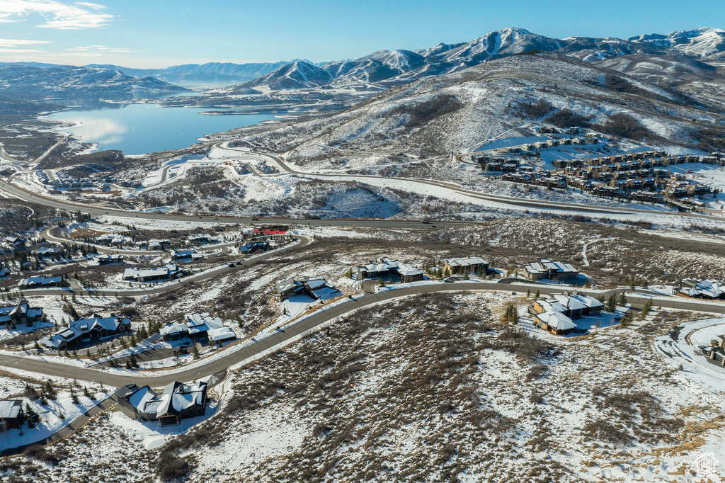 Snowy aerial view with a mountain view