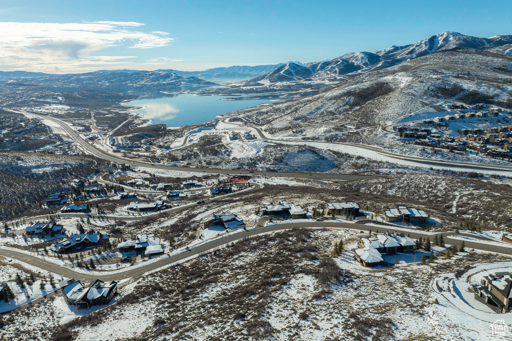 Snowy aerial view with a mountain view
