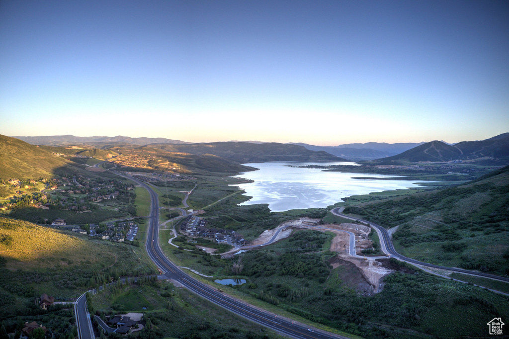 Aerial view at dusk of a water and mountain view
