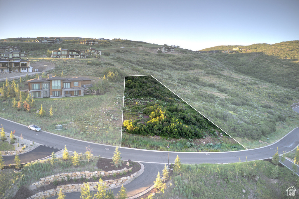 Aerial view of property and surrounding area with property boundaries highlighted