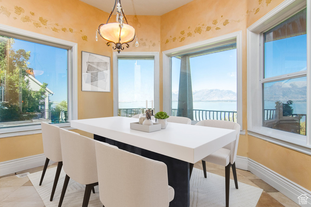 Tiled dining area with a mountain view