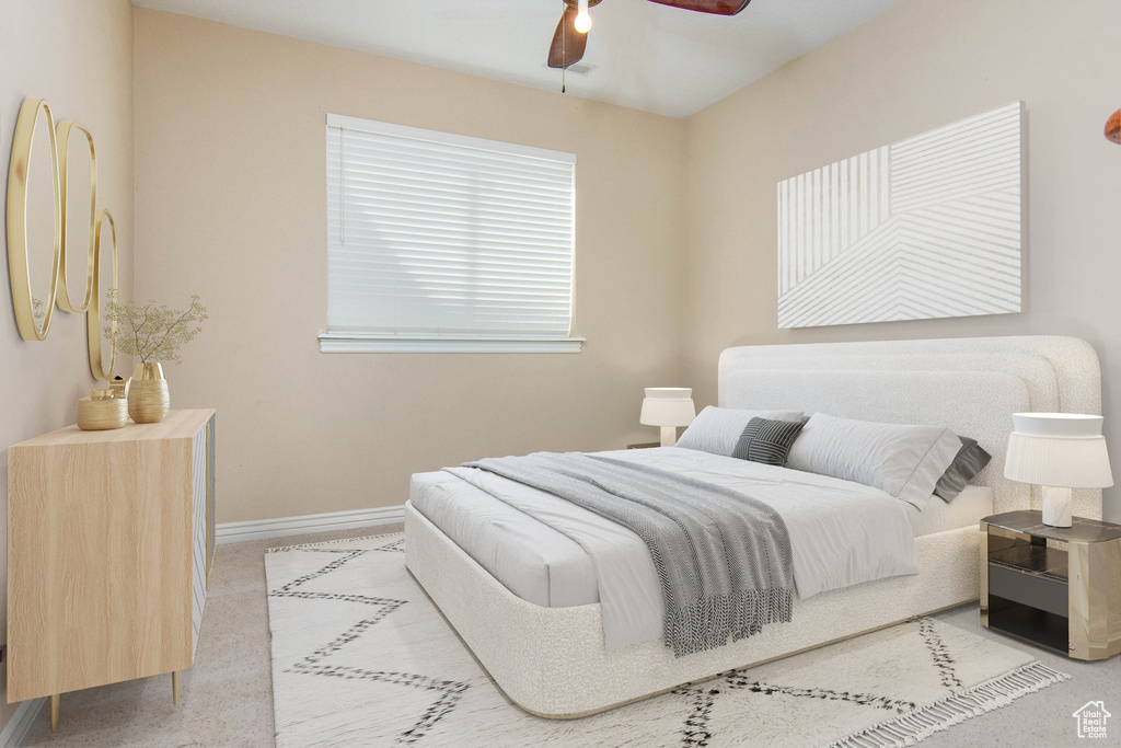 Bedroom featuring ceiling fan and light colored carpet