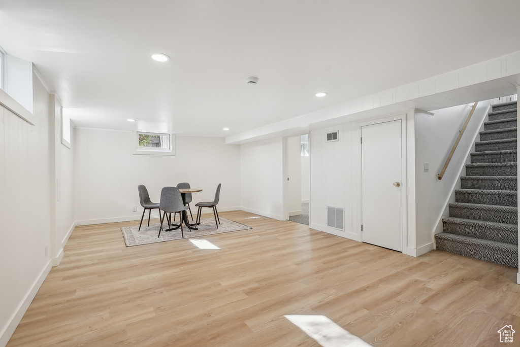 Unfurnished dining area with light wood-type flooring