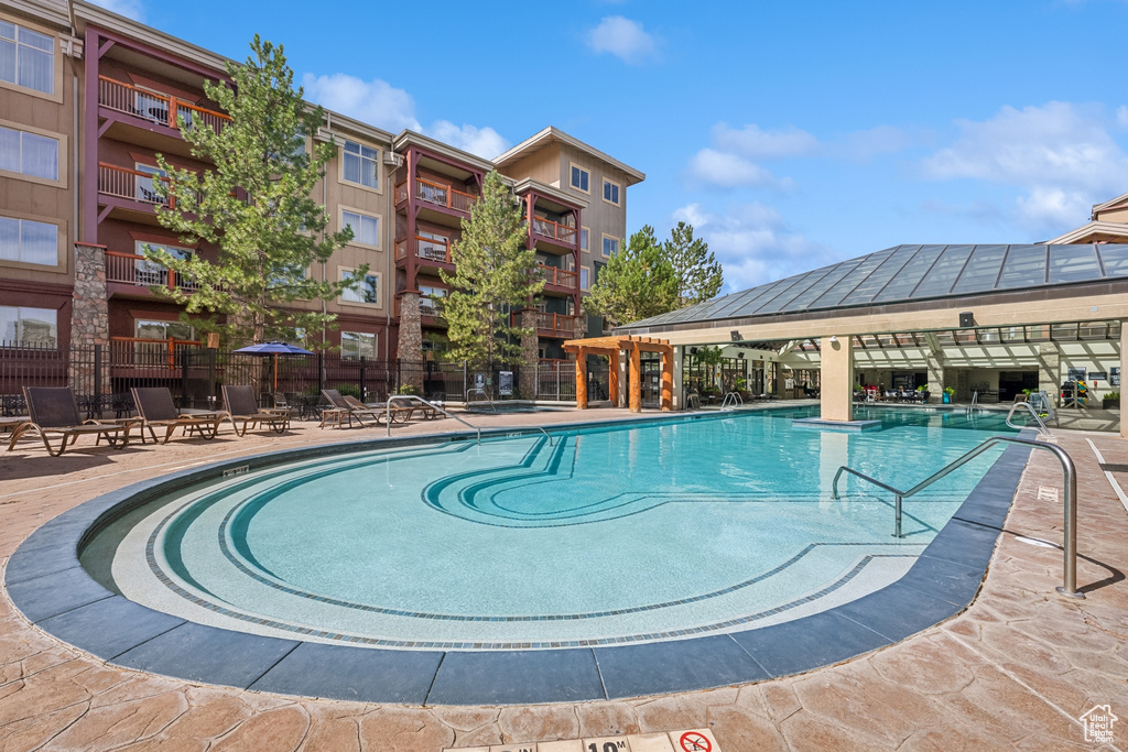 View of swimming pool with a gazebo