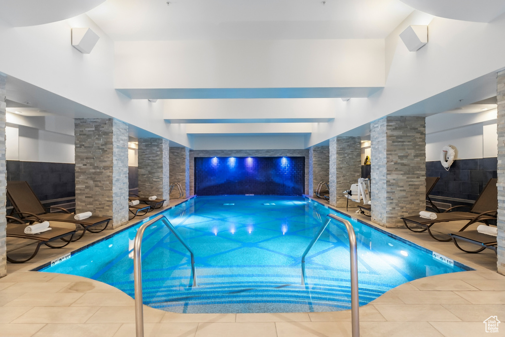 View of pool with decorative columns