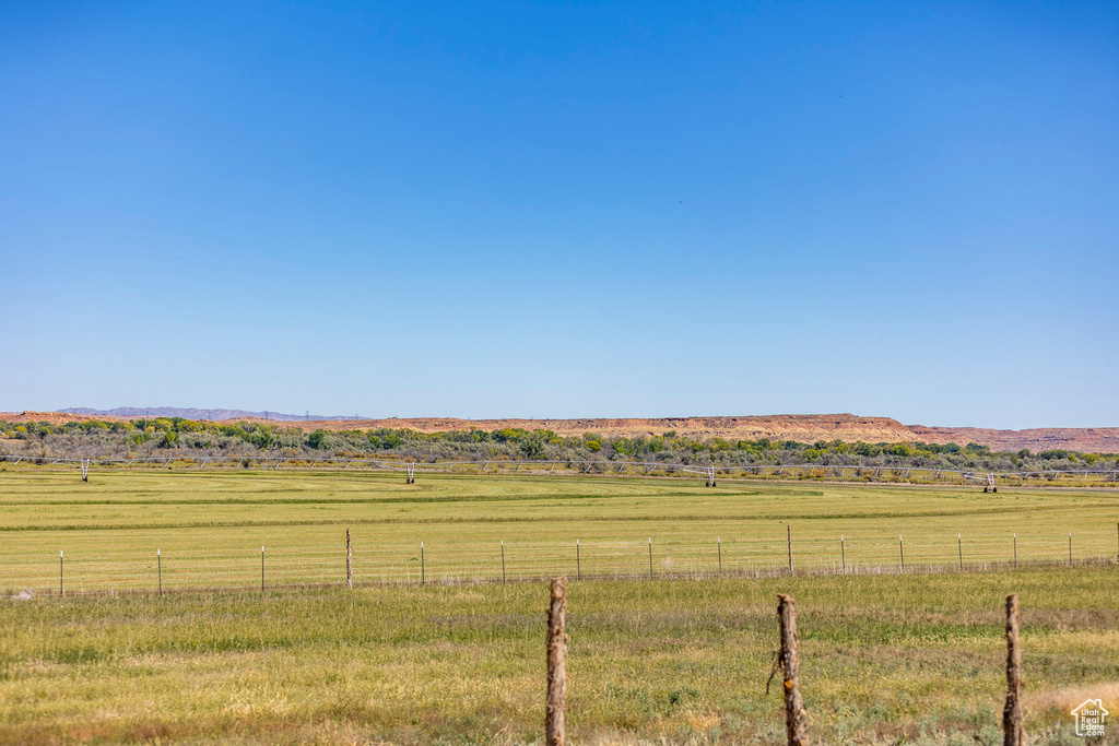 View of yard with a rural view