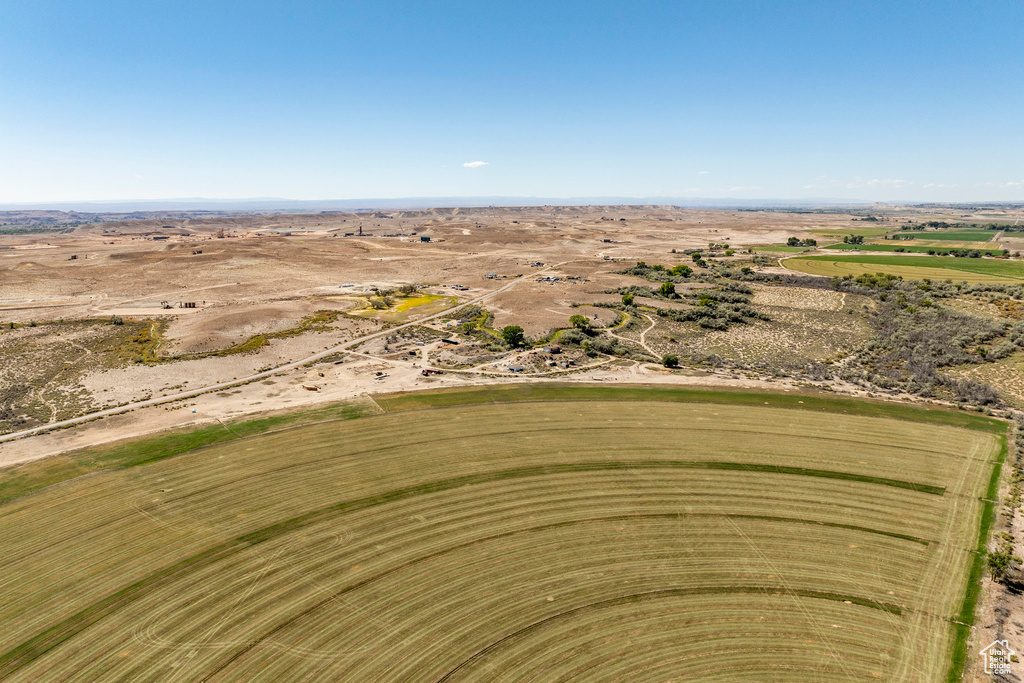 Birds eye view of property with a rural view