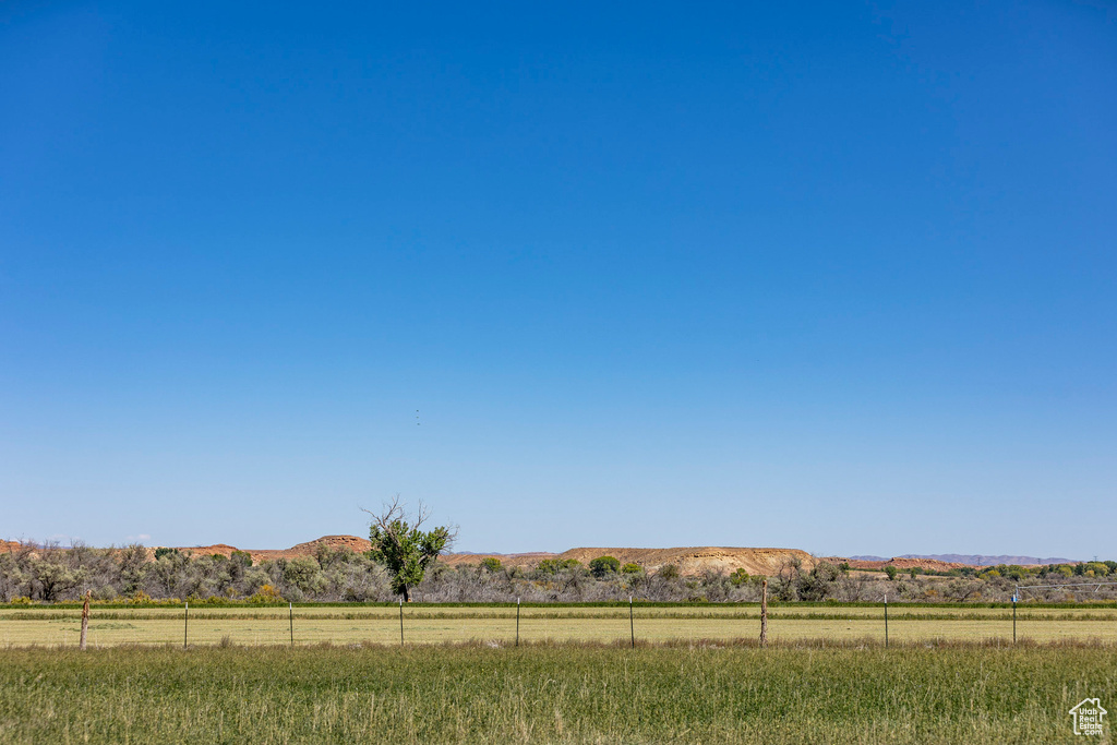 View of yard featuring a mountain view and a rural view