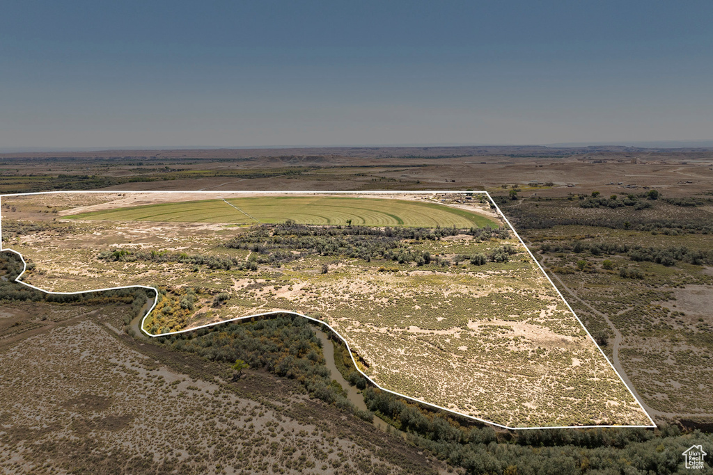 Birds eye view of property featuring a rural view