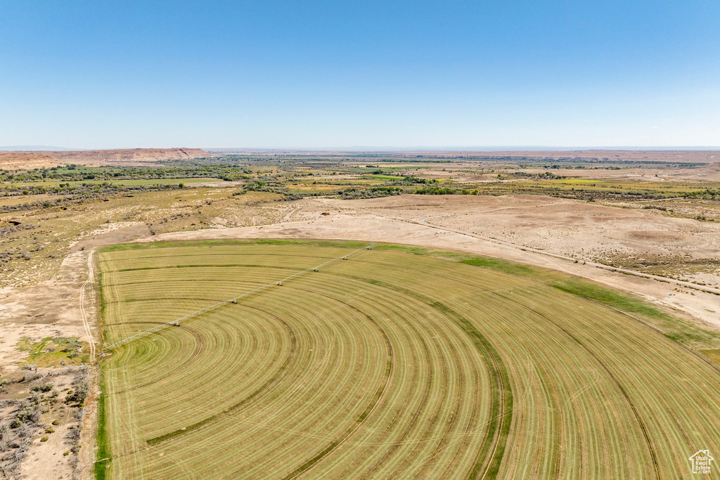 Birds eye view of property with a rural view