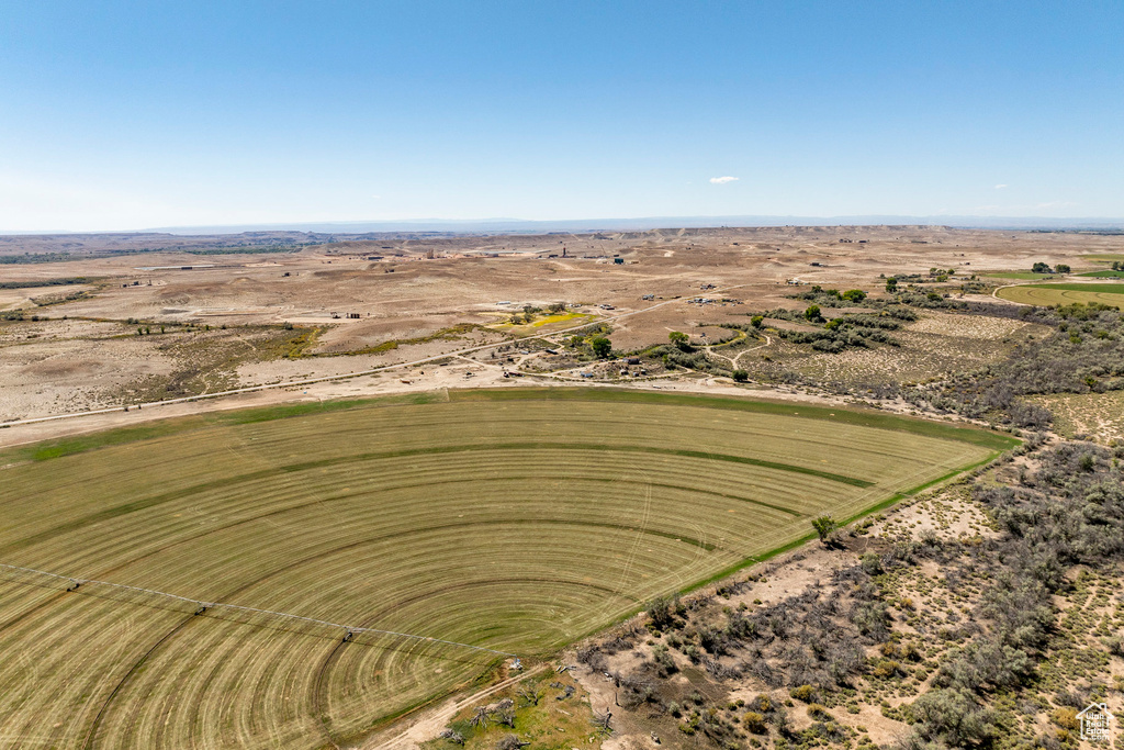 Birds eye view of property featuring a rural view