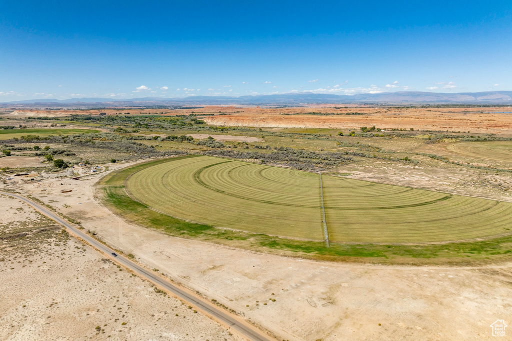 Drone / aerial view with a mountain view and a rural view