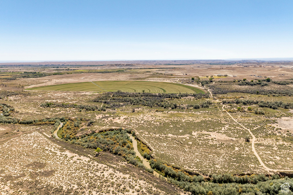 Birds eye view of property with a rural view