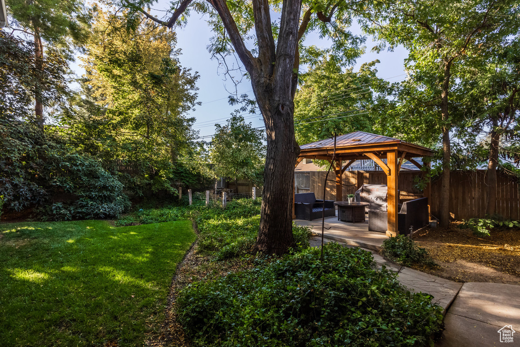 View of yard with a patio and a gazebo