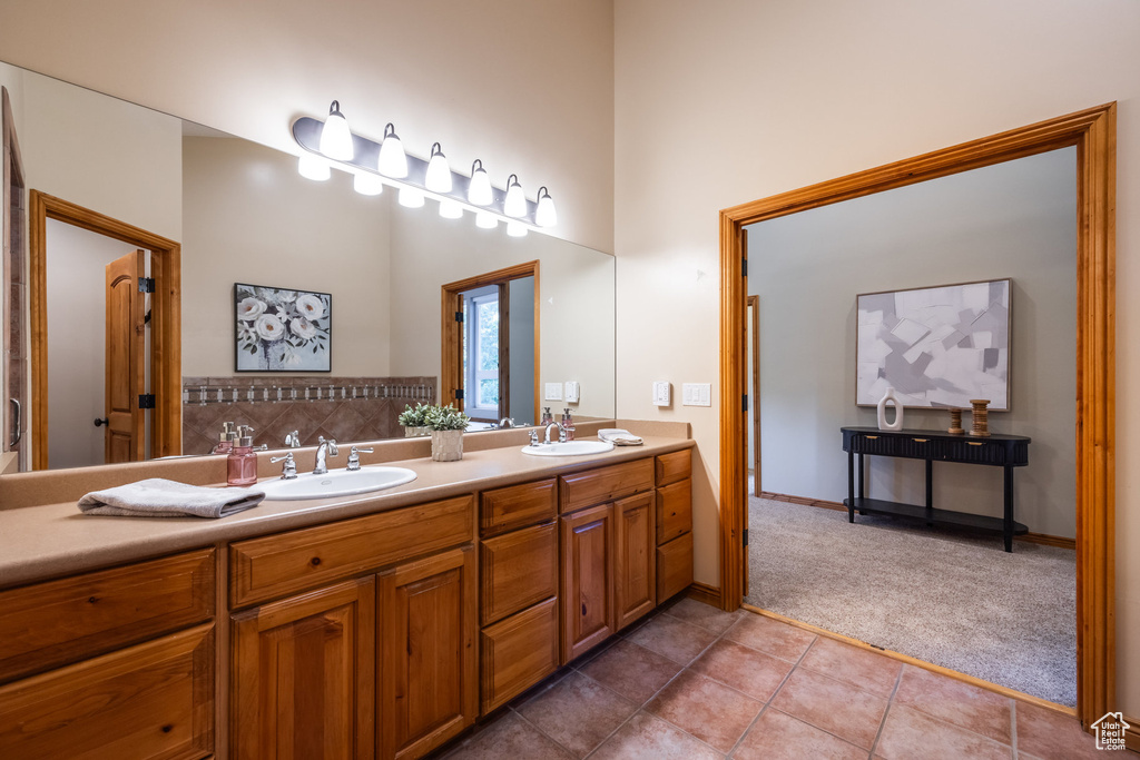 Bathroom featuring vanity and tile patterned flooring