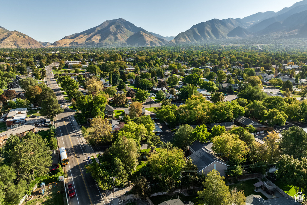 Birds eye view of property with a mountain view