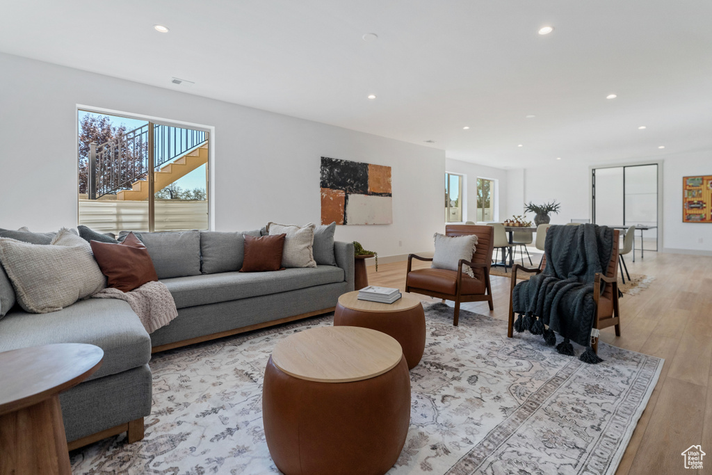 Living room with light wood-type flooring