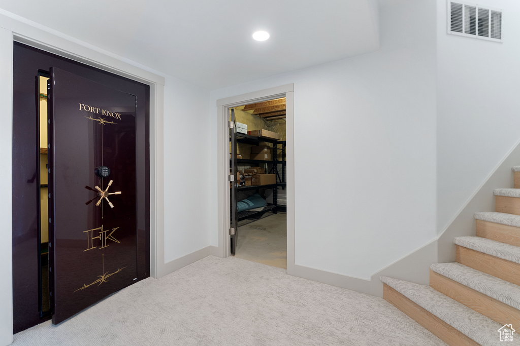 Corridor with carpet floors