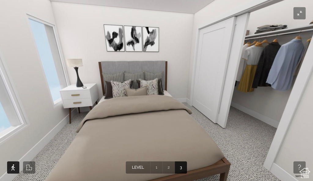 Carpeted bedroom featuring a closet