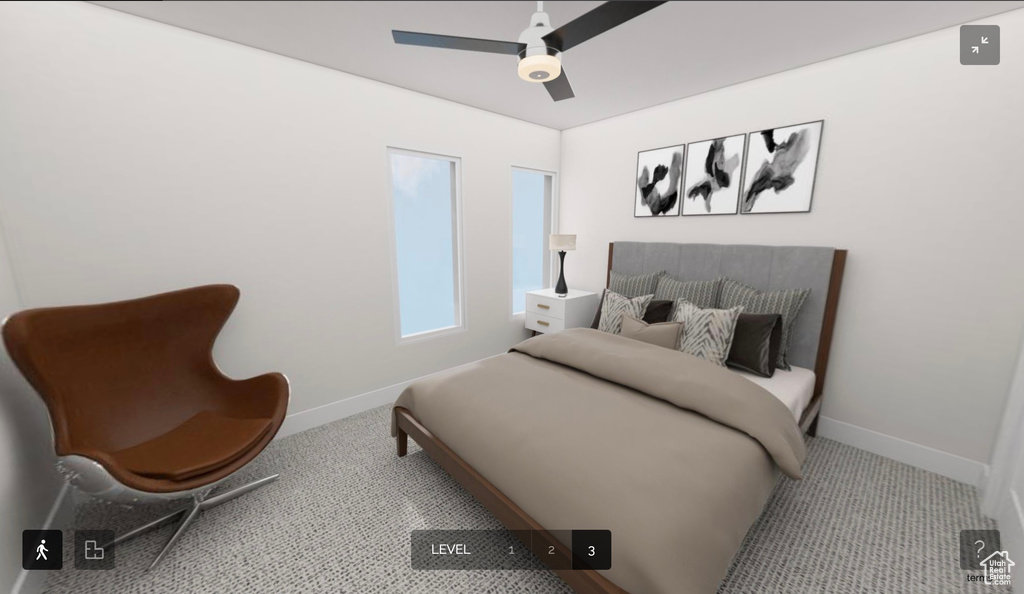 Bedroom with ceiling fan and light colored carpet