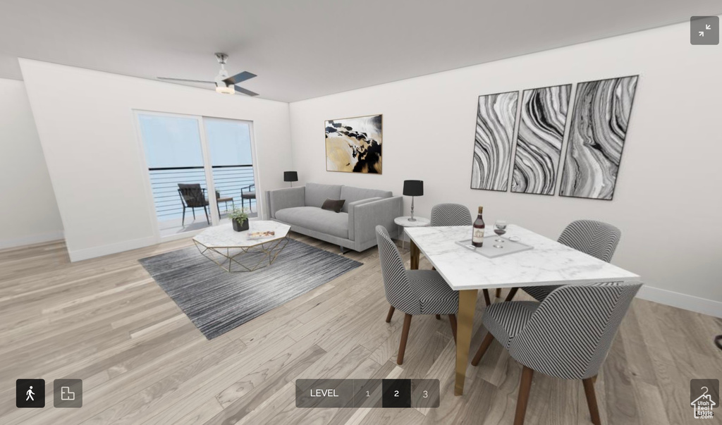 Dining area featuring ceiling fan and light hardwood / wood-style flooring