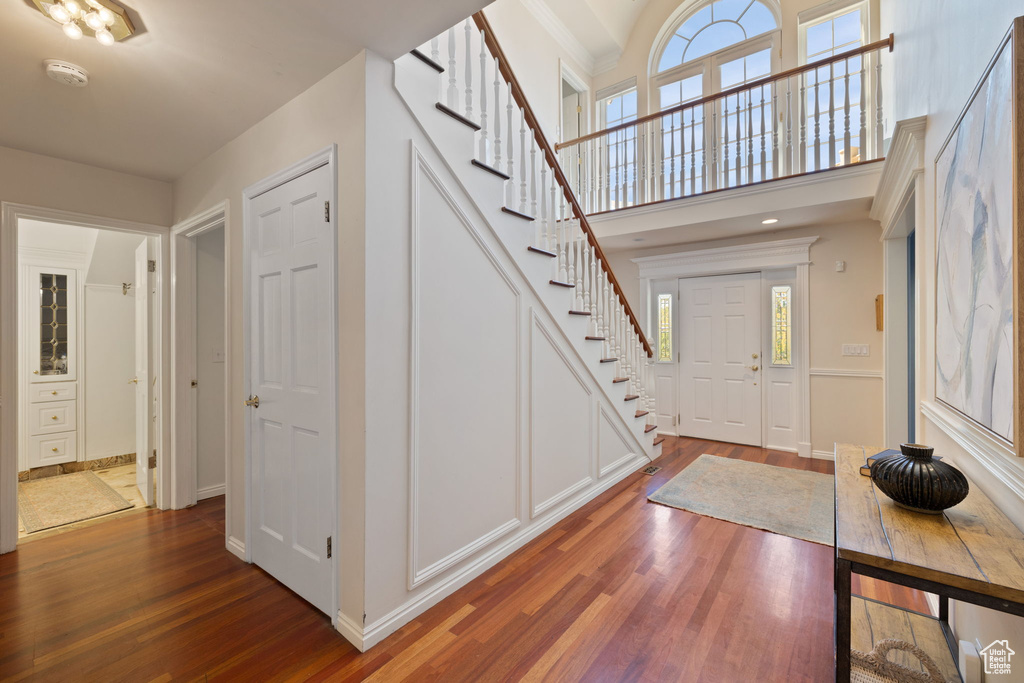 Foyer entrance featuring dark hardwood / wood-style flooring