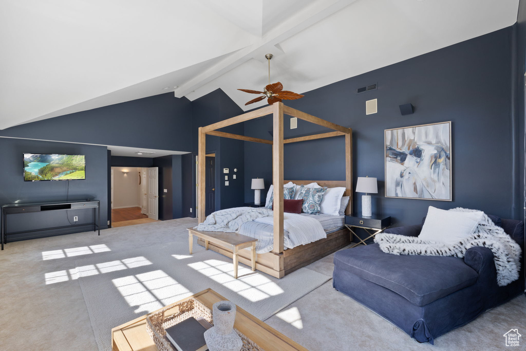 Bedroom featuring ceiling fan, light carpet, beam ceiling, and high vaulted ceiling