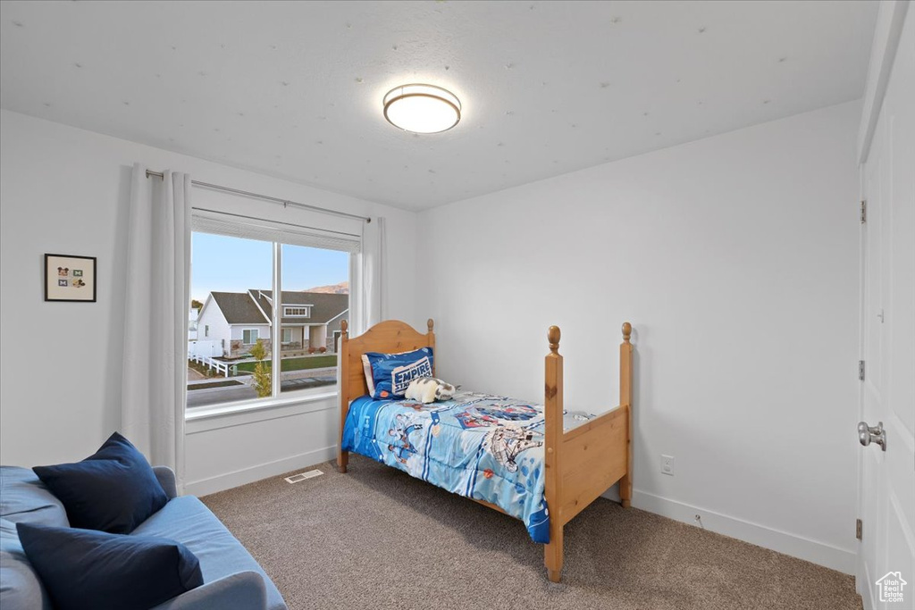 View of carpeted bedroom