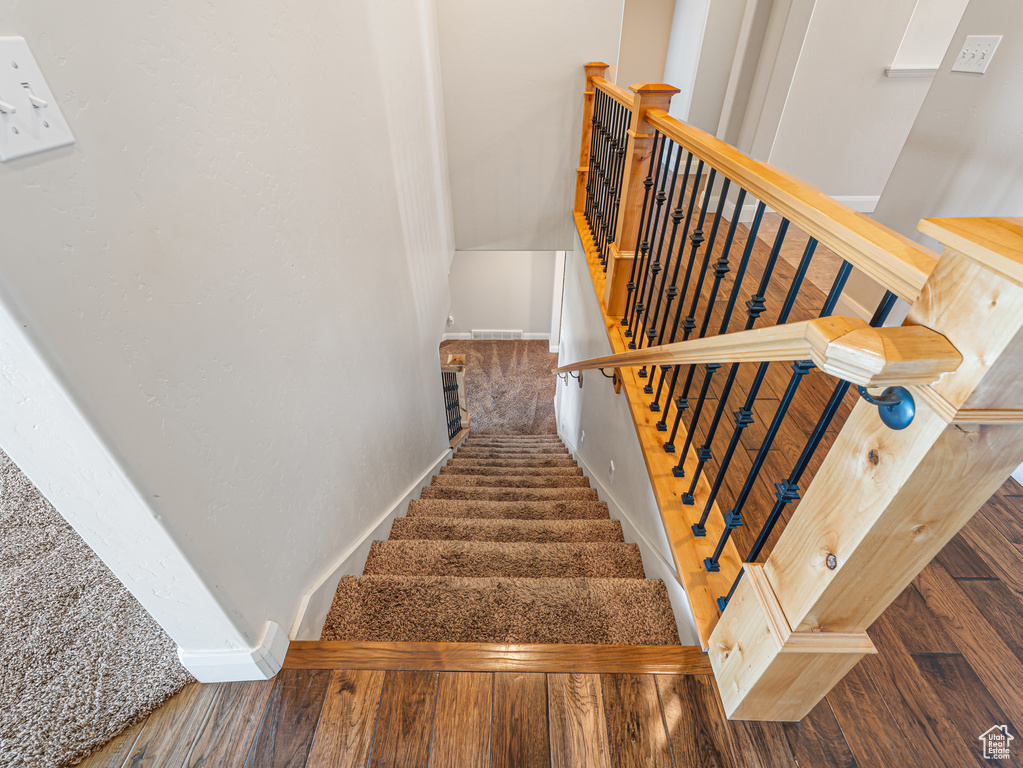 Stairs featuring baseboards