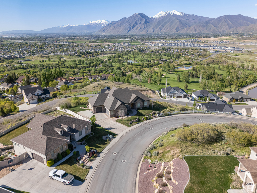 Birds eye view of property featuring a mountain view and a residential view